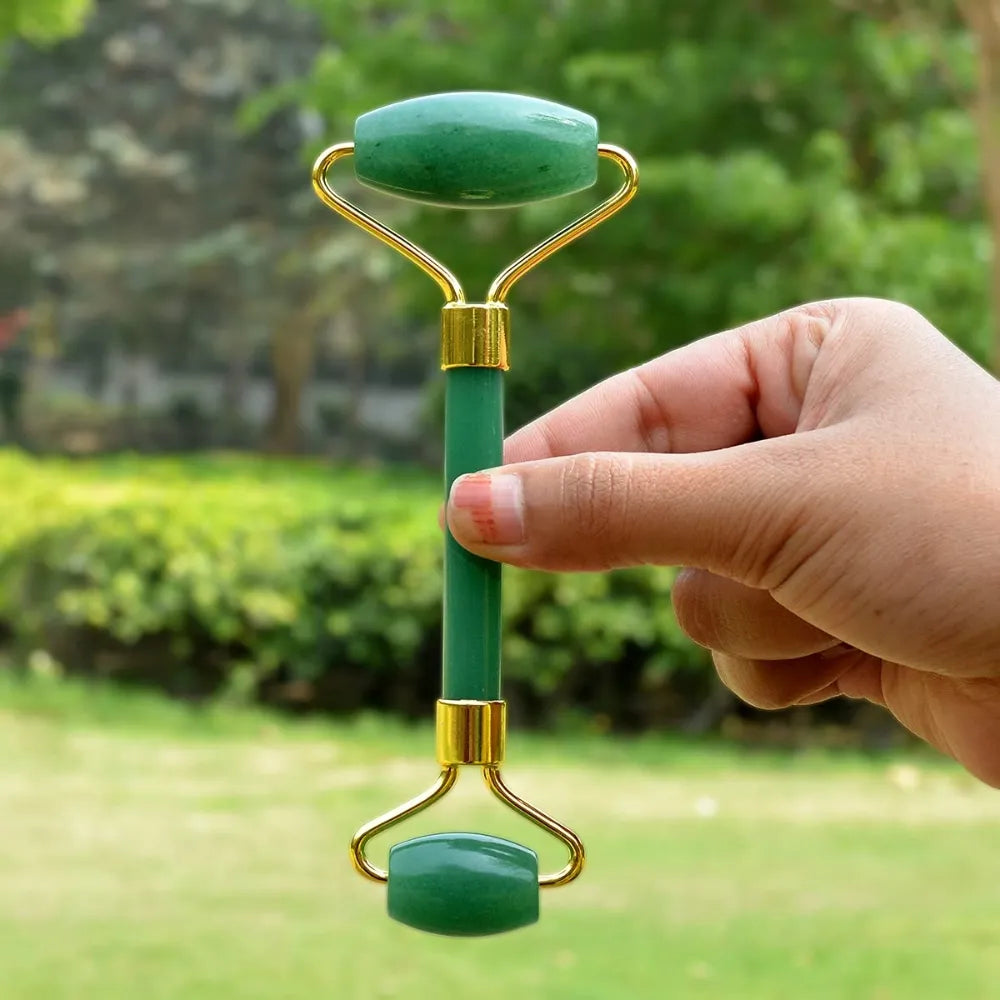 Person using the jade roller on their face, showing its soothing effect and skin rejuvenation benefits.
